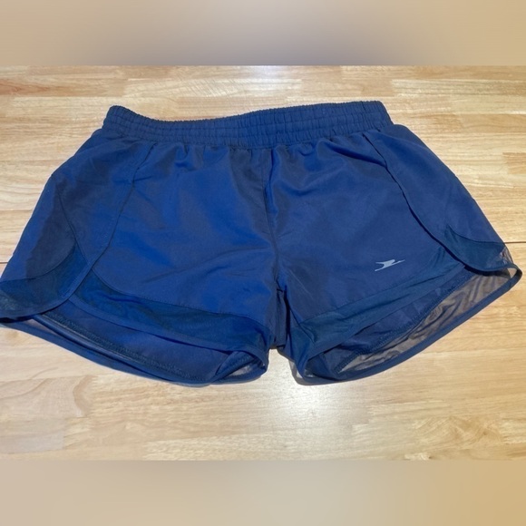 Women’s blue Crane running shorts is size medium - Picture 1 of 3